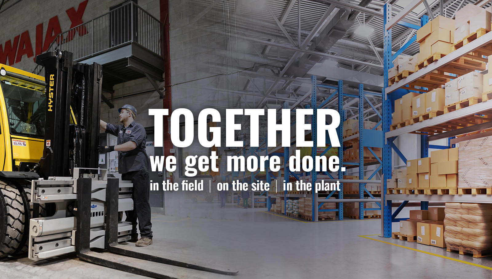 Together We Get More Done Wajax worker inspecting forklift